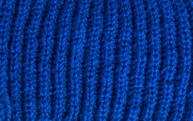 Yumuşak, tüylü kumaşların lacivert arka planı. Açık renk kot bebek bezi dokusu