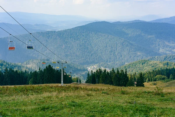 Lift in the Carpathians among spruce trees — Stock Photo, Image
