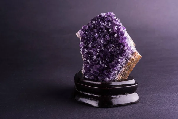 Amethyst geode on black background