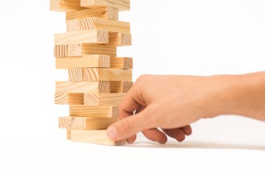 Tahta bloklar Jenga oyunu ve elini Kulesi