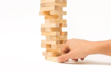 Tahta bloklar Jenga oyunu ve elini Kulesi