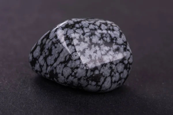 Obsidian geode on black background — Stock Photo, Image