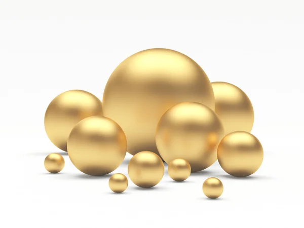 Group of golden spheres of different diameters — ストック写真