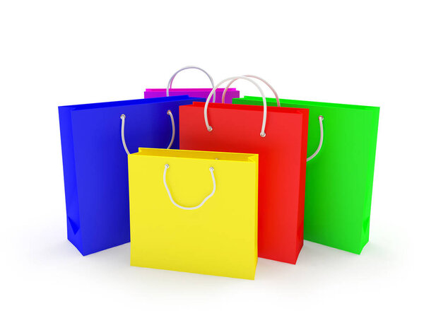 Multicolored shopping bags on white