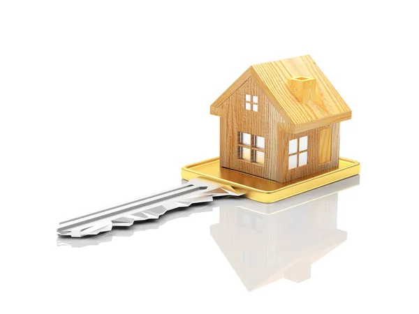 Houten huis figuur op de sleutel met reflectie. — Stockfoto
