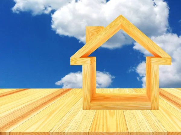 Ícone de casa em um soalho de madeira contra um céu nublado azul — Fotografia de Stock