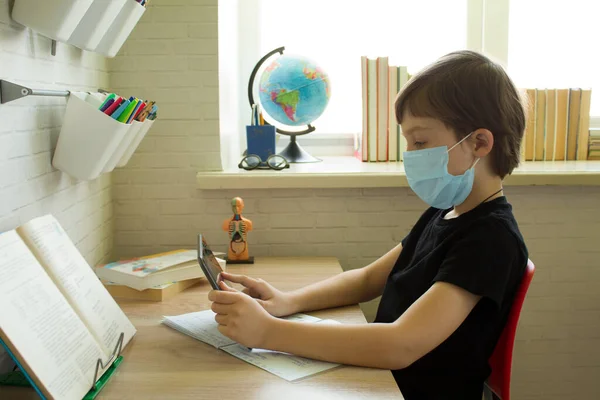 Distance Learning Online Education Schoolboy Medical Mask Home Doing Homework — Stock Photo, Image