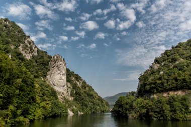 Decebal Head sculpted in rock, carved in the mountains, Eselnita, Danube Gorges (Cazanele Dunarii) ,Iron Gates Natural Park, Romania clipart