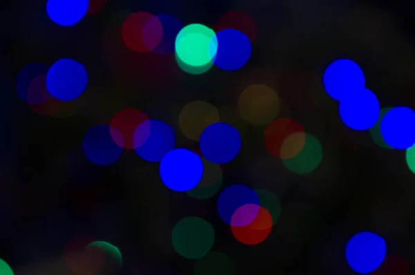 Luci bokeh su sfondo nero — Foto Stock