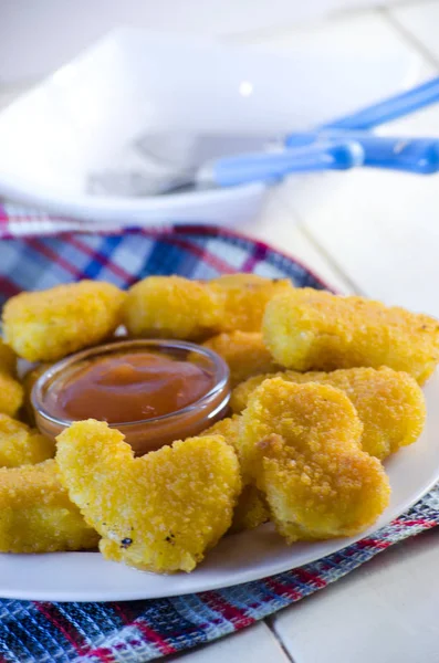 Crispy chicken nuggets with tomato sauce — Stock Photo, Image