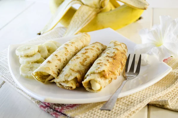 Pancakes with cottage cheese and banana — Stock Photo, Image