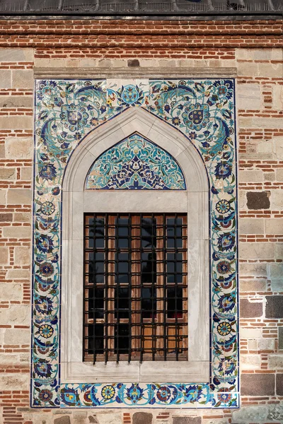 Window of colored stone building — Stock Photo, Image