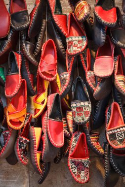 Colorful handmade leather shoes clipart