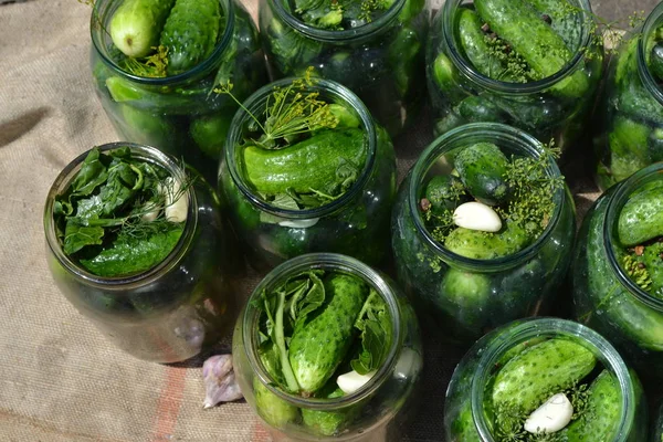 Homemade food. Natural products from the garden. Village, cottage, farm, cellar. Tasty and healthy. Preservation. Blanks for the winter. Marinated. Cucumbers in jars. Horizontal