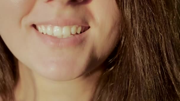 Smile of a beautiful and attractive girl close-up, 4k — Stock Video