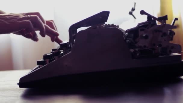 Female hands press buttons on an old typewriter. Soft blurry light. 3840x2160 — Stock Video