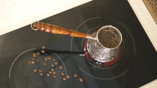 A delicious aromatic coffee is on the stove brewed. 4k, 3840x2160. HD — Stock Video