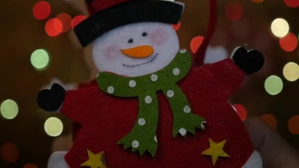 Cheerful and happy snowman in a cylinder, dancing in colorful lights. slow motion, 1920x1080, full hd — Stock Video