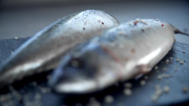 Fresh pink salmon in spices on the cutting board, cooking of fish dish, healthy meals at home — Stock Footage Fresh pink salmon in spices on the cutting board, cooking of fish dish, healthy meals at home Stock Video