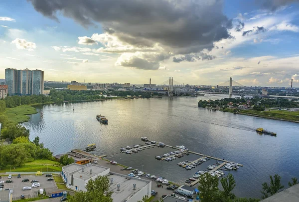 Top view of the Neva rivers and the urban Rybvtskoye microdistri — Stock Photo, Image