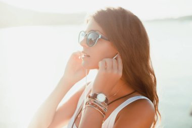portrait of girl in earphones clipart