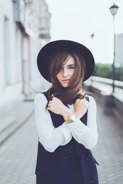 Young girl posing on street