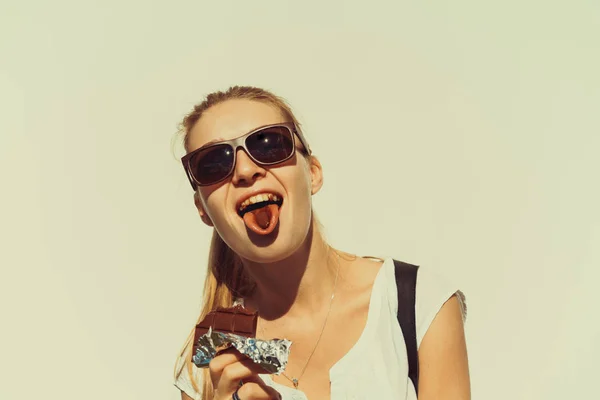 Happy Woman eating chocolate — Stock Photo, Image