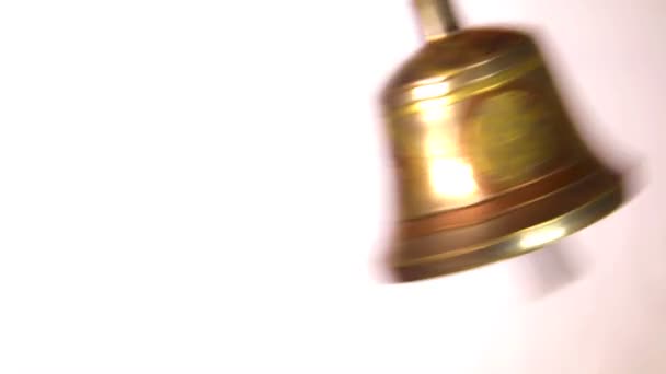 Antique brass ships bell on a white background — Stock Video