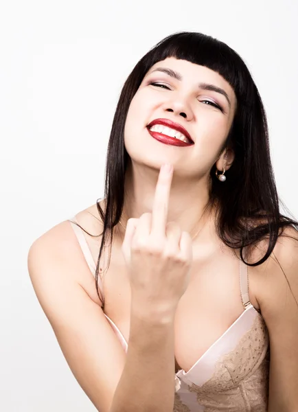 Beautiful young sexy woman showing middle finger — Φωτογραφία Αρχείου