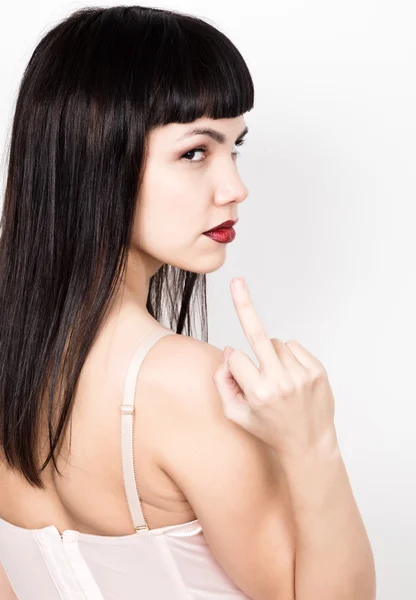 Piękna młoda kobieta sexy wyświetlone środkowy palec — Zdjęcie stockowe