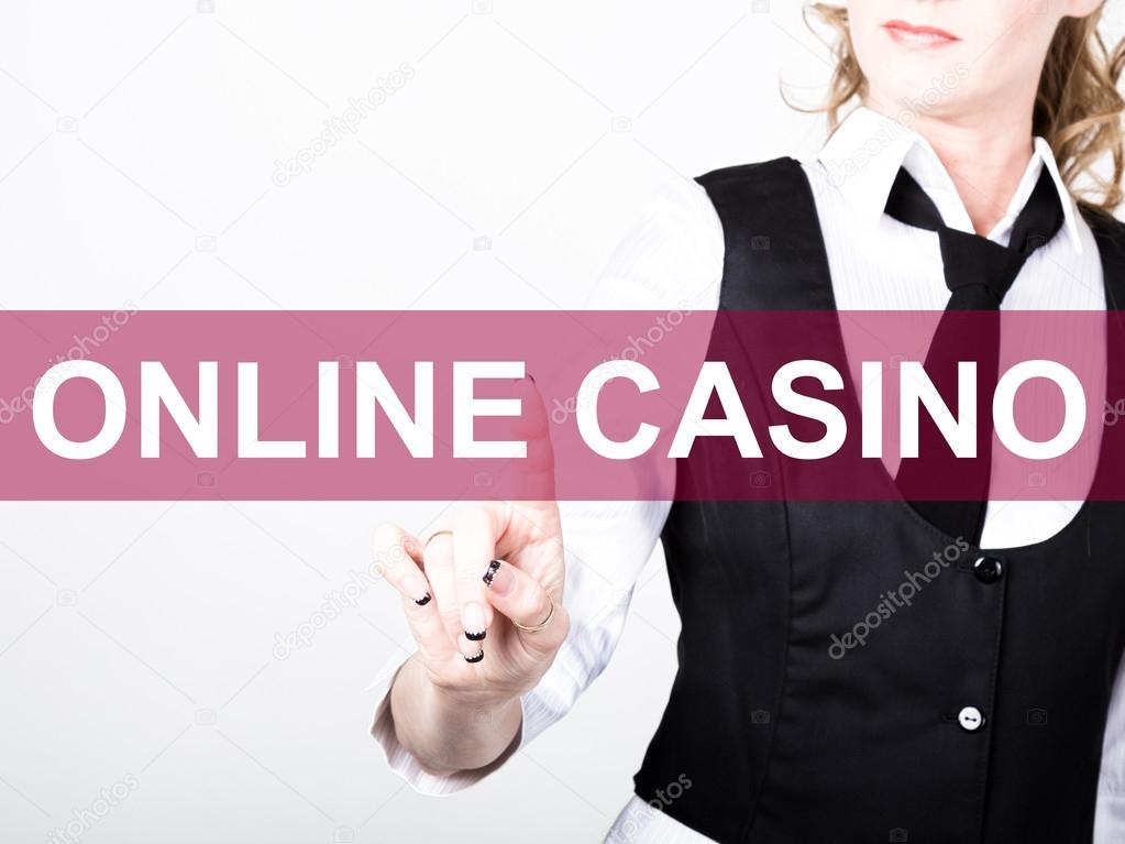 online casino written on virtual screen. technology, internet and networking concept. woman in a black business shirt presses button on virtual screens