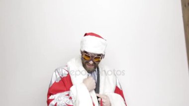 işadamı ile bir takım elbise Noel Baba yüzünü için kamera getirdim, kamerayla iletişim kim vardı görmek için çalışıyorum,