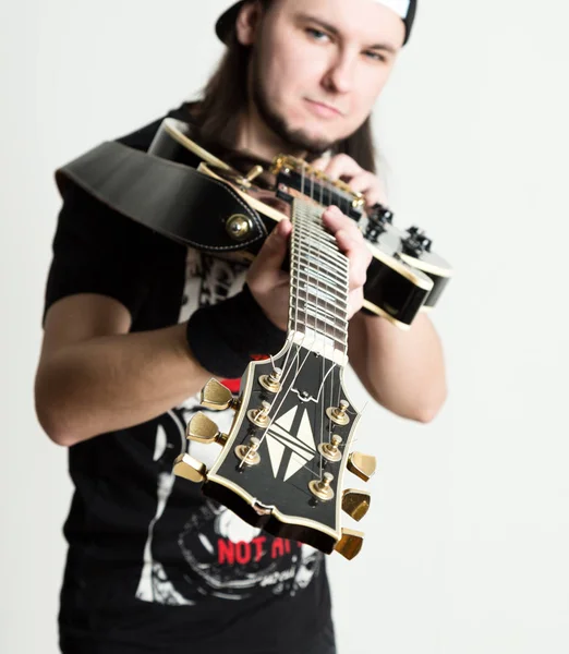 Guitarists of a rock band with guitar, close-up guitar neck — Stock Photo, Image