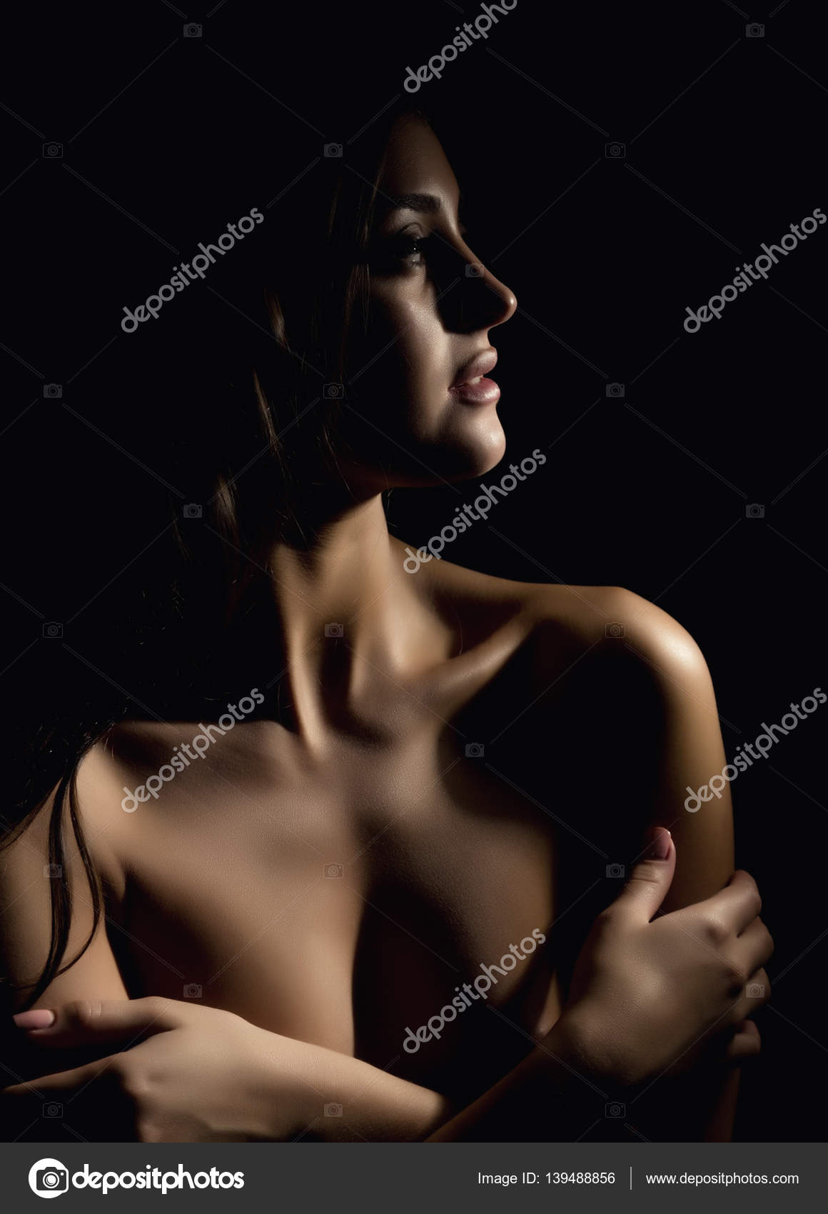 Silhouette of nude beautiful asian woman on black background Stock Photo by  ©sandy-che.yandex.ru 139488856