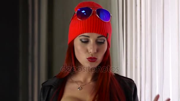 Young hipster woman with big tits at home standing near the window and reading book - Stock ...