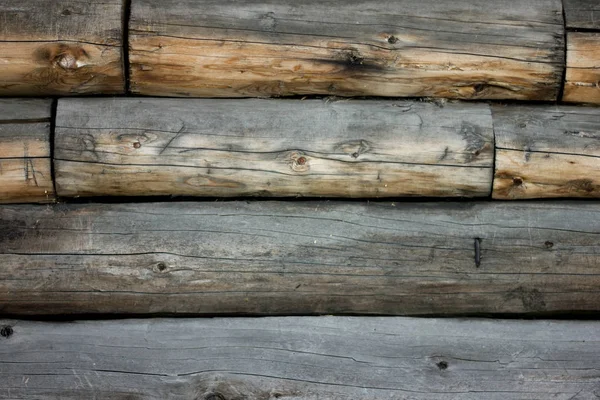 Pared de tronco viejo marrón gris, fondo con textura de madera — Foto de Stock