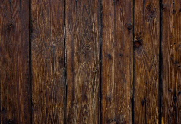 ऊर्ध्वाधर पुराने अंधेरे भूरे लकड़ी की पट्टियाँ पृष्ठभूमि — स्टॉक फ़ोटो, इमेज