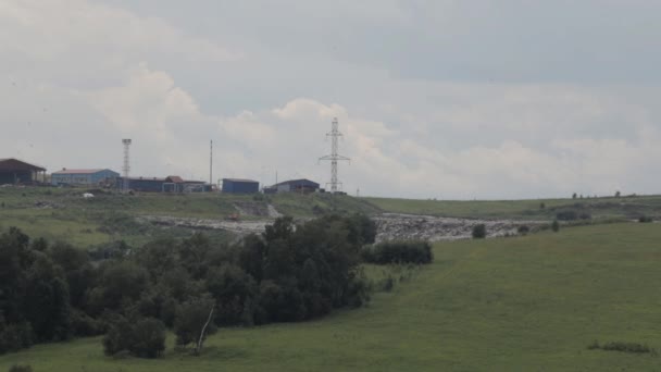 City dump and Garbage factory on a nature background — Stock Video