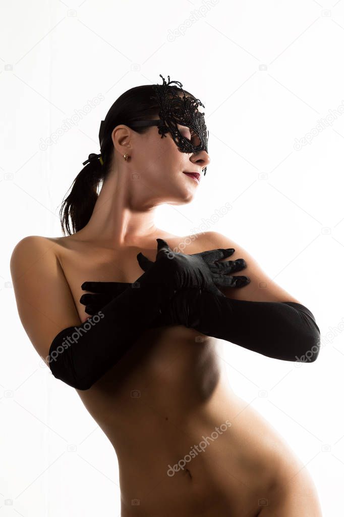 Nudel elegant girl with black gloves and lace mask. Vintage style