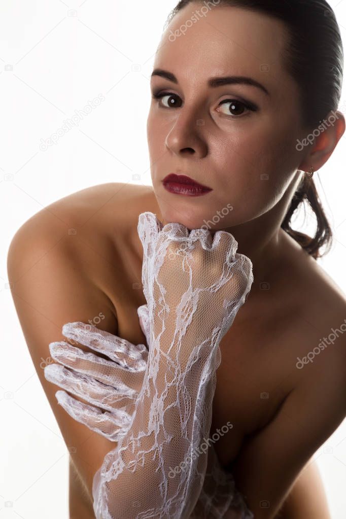 Nudel elegant girl with white lace gloves. Vintage style