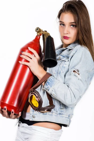 Sexy Sensual Female Firefighter With A Red Fire Extinguisher With Free Space For Your Text 