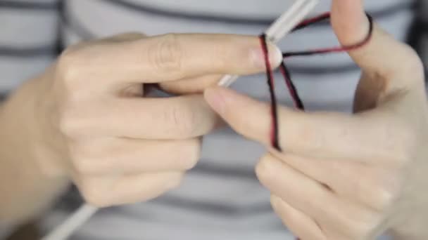 Close-up hands with knitting needles, beautiful woman knits — Stock Video