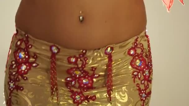 Torso of beautiful young arabian woman dancing oriental belly dance. 4K — Stock Video