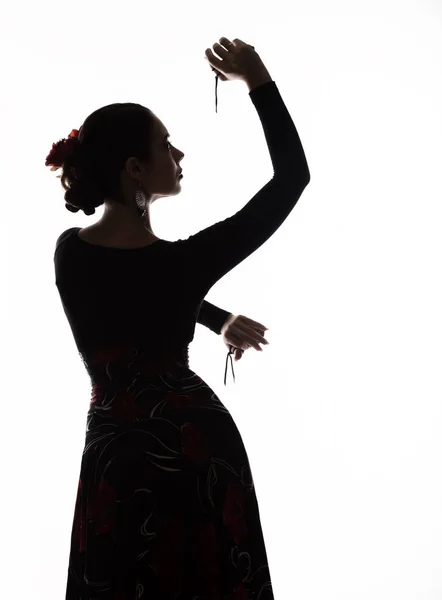 Silueta de bailarina flamenca española sobre fondo claro — Foto de Stock