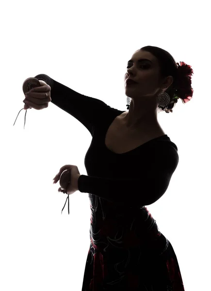 Silhueta de espanhol menina flamenco dançarina em um fundo leve — Fotografia de Stock