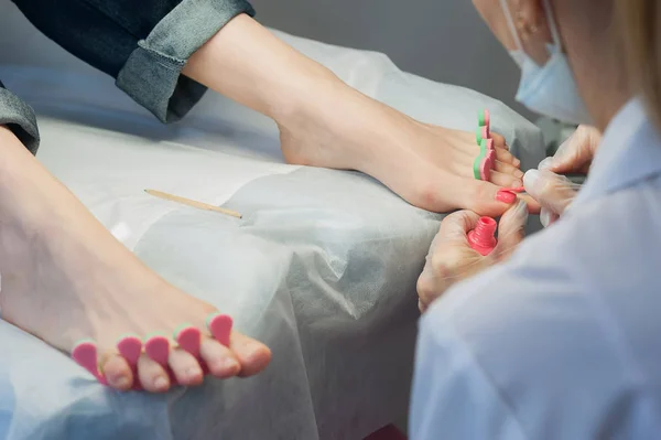 Profesional nail technician sanding nails with machine — Stock Photo, Image