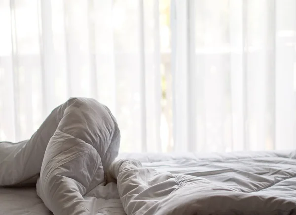 Bed sheet and pillow messed up in the morning — Stock Photo, Image