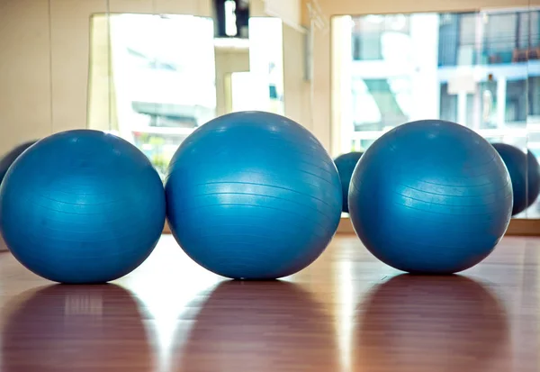 Yoga ball and map in fitness room.  Healthy Concept.