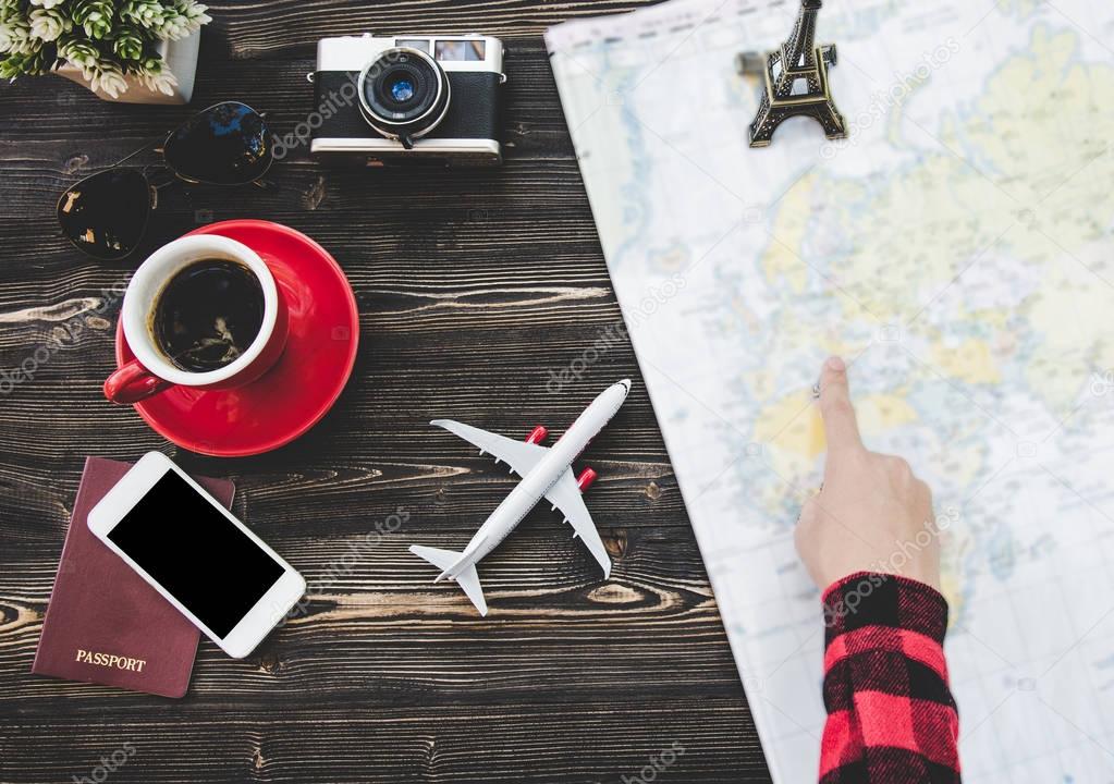 Traveler tourist planning concept on map with camera and passport.  Travel Concept