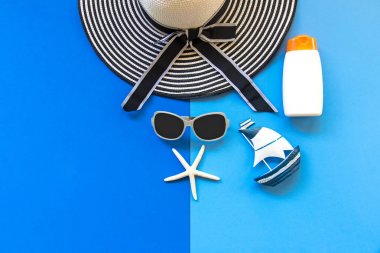 Summer Fashion woman big hat and sunglasses go to travel in the beach. Tropical sea. Unusual top view,  background.  Summer Concept. clipart